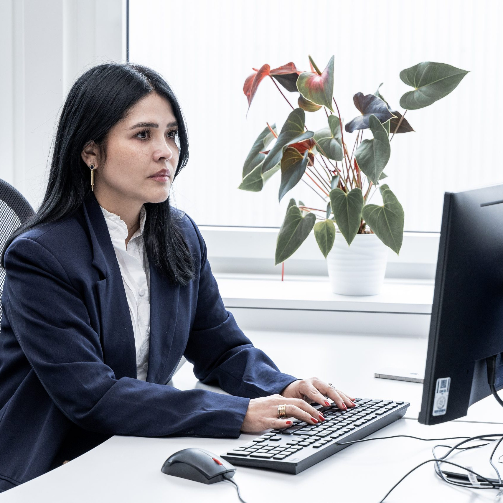 Businessfrau am Rechner